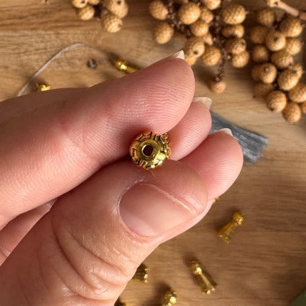 1 x Gold-plated tassel end cap, playful design, for DIY jewelry making.