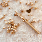 Threader for small wooden beads